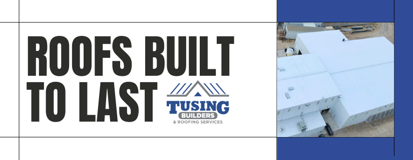 An aerial view of a large industrial facility with a white single-ply membrane installation by a professional commercial roofing contractor in Cleveland.